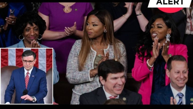 Congressional members applauding during a speech with alert