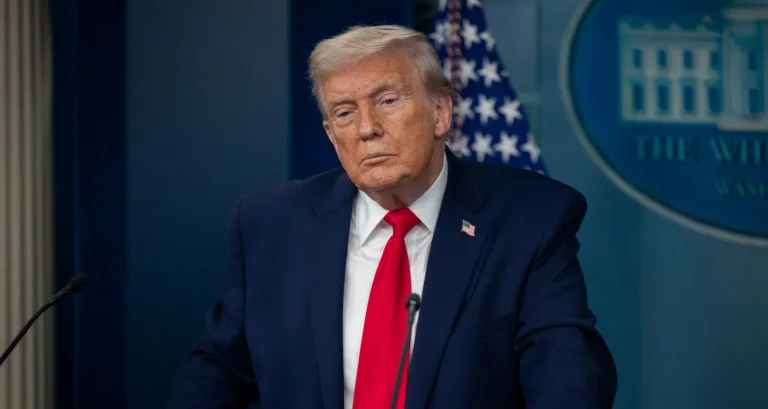 former President Donald Trump at White House press briefing podium