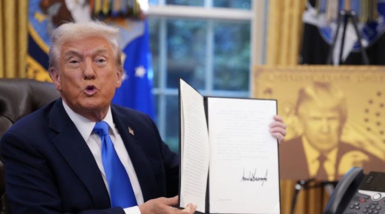 Trump shows signed document for seniors 65+