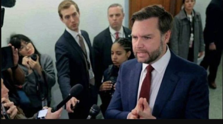 JD Vance speaking to cameras at the Capitol.