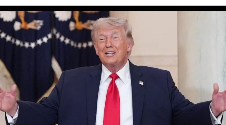 Trump smiling ear to ear with arms outstretched