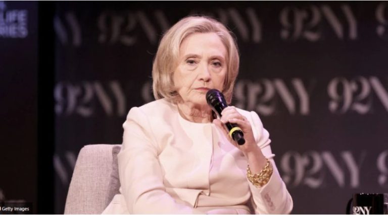 Hillary Clinton speaking at 92NY event with microphone