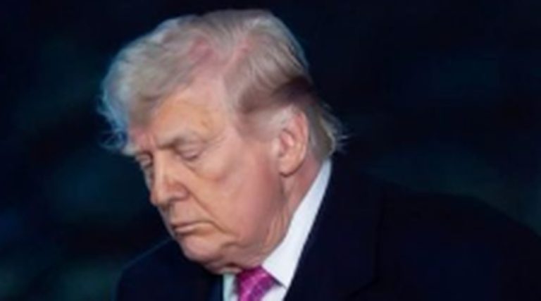donald Trump looking down, reflecting on recent events