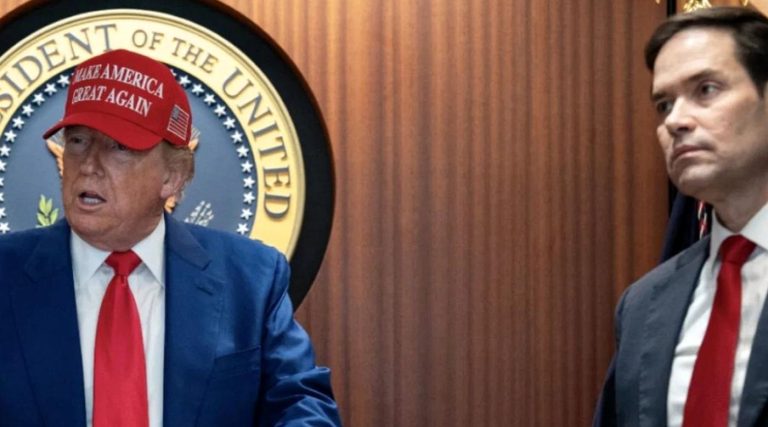 donald Trump wearing red Make America Great Again hat beside Marco Rubio at presidential