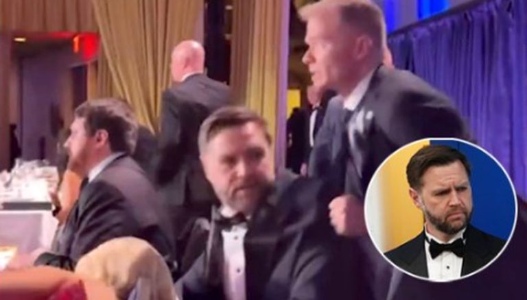 tense moment at a formal event with men in tuxedos