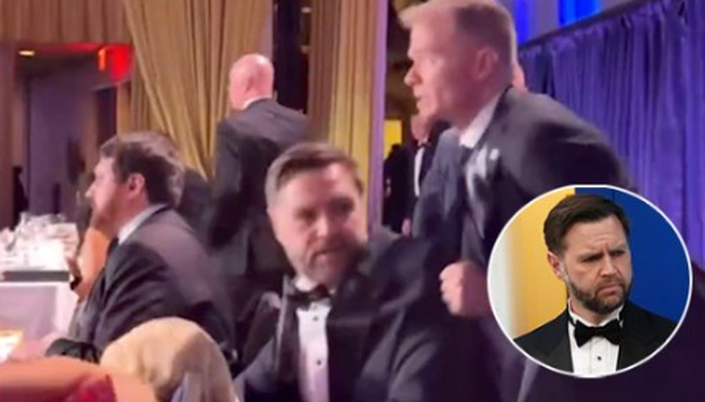 tense moment at a formal event with men in tuxedos