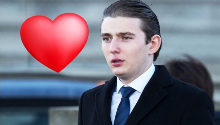 young man in formal attire with heart graphic, expressing emotion