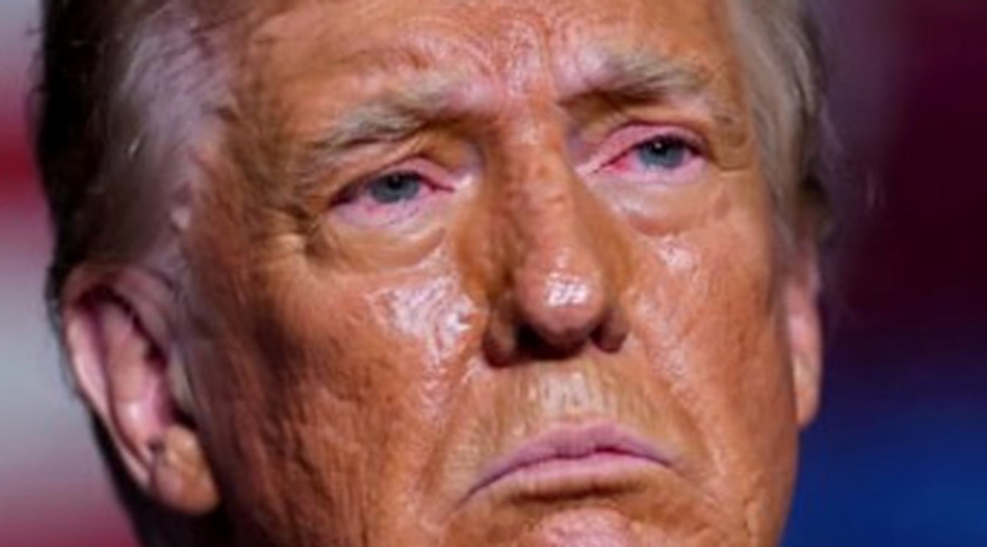 close-up of a serious man with distinct facial features and expression