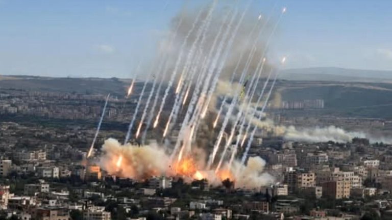 explosive missile strikes over urban landscape during conflict