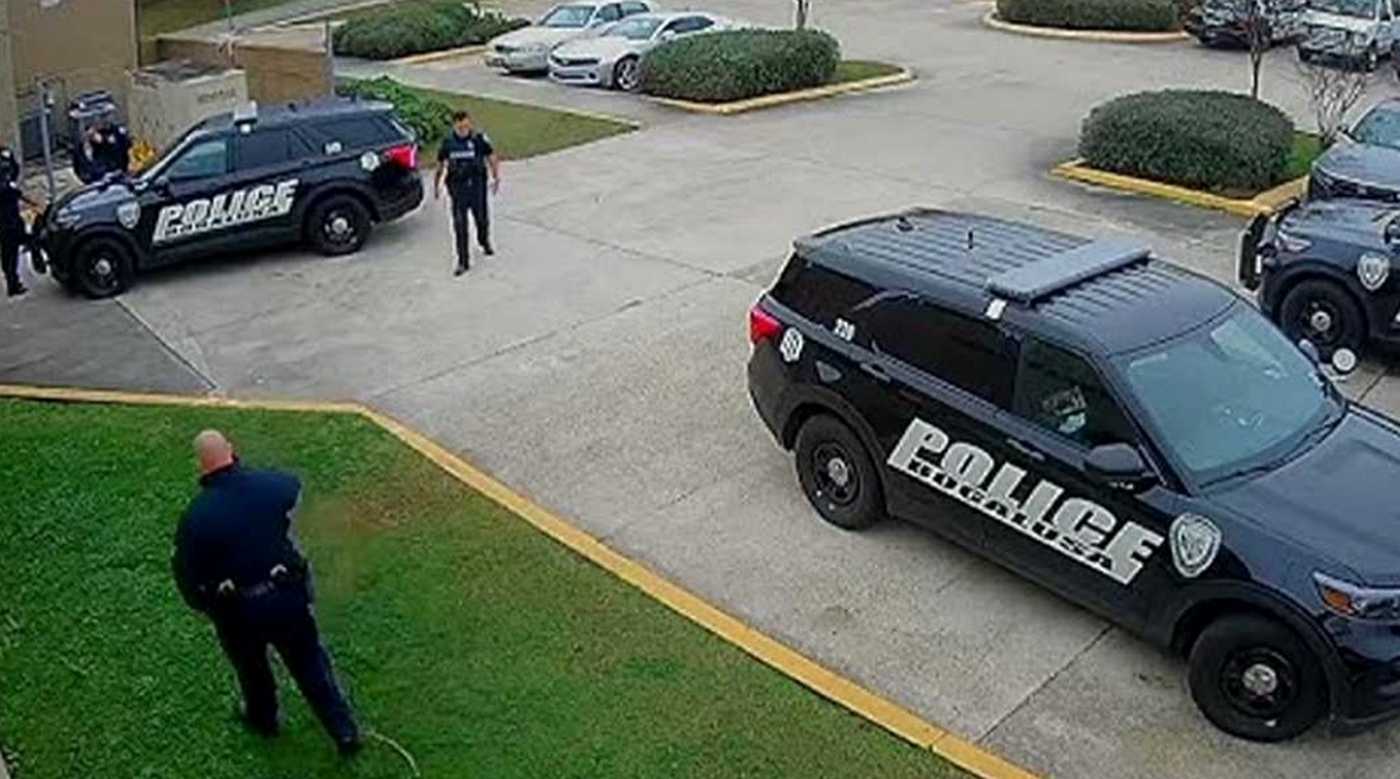 multiple San Antonio Police SUVs parked in commercial lot with officers investigating