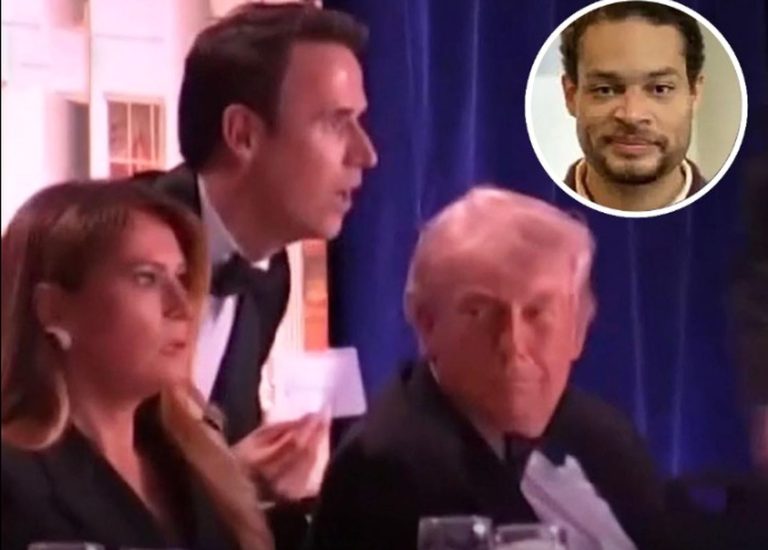 donald Trump at a formal event with guests nearby