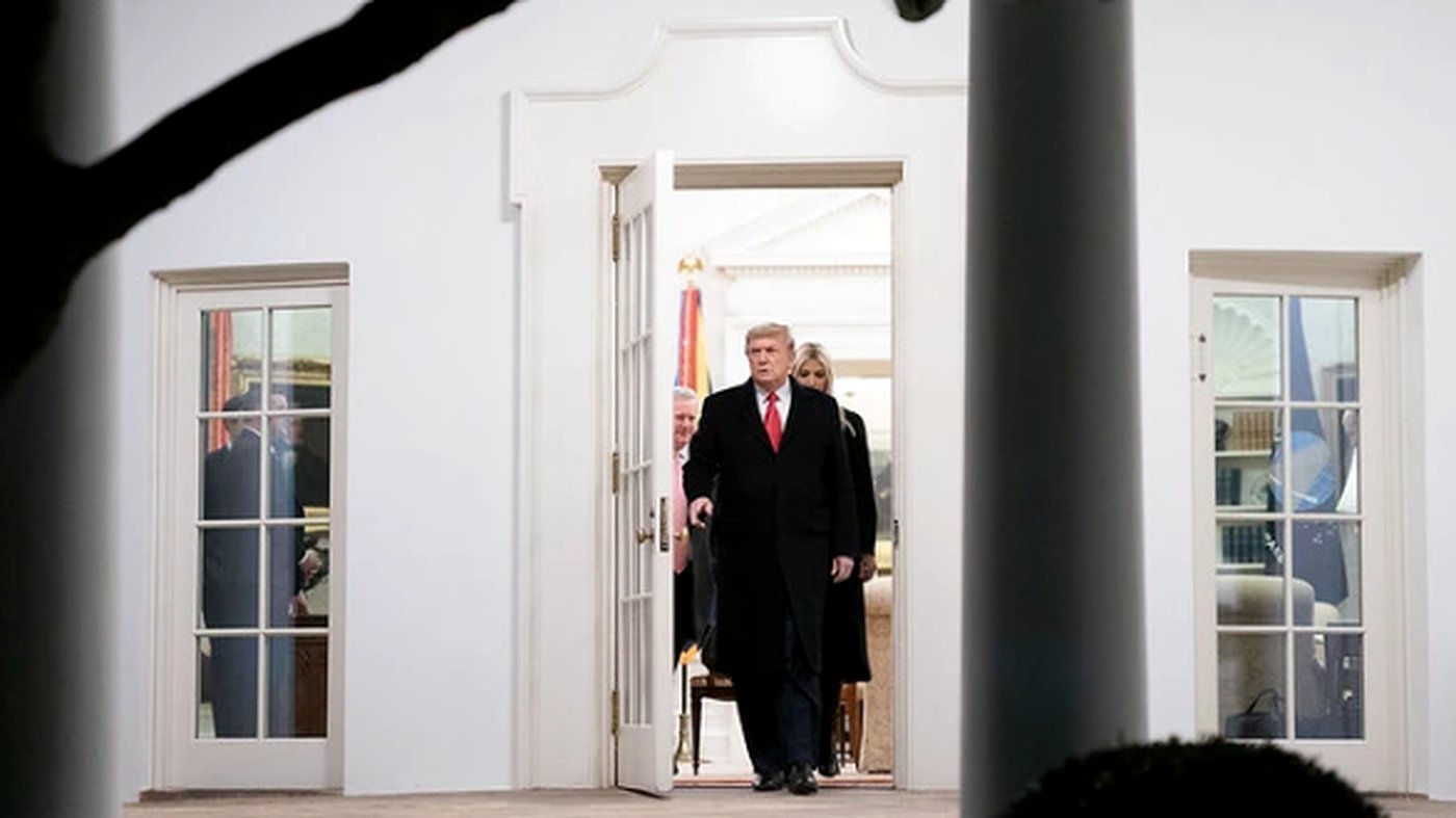 former president exits the White House in formal attire