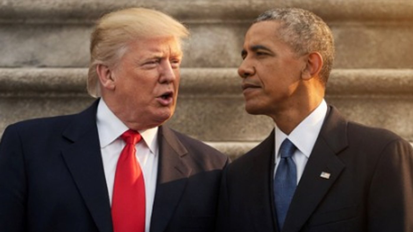 two former U.S. presidents engaged in conversation outdoors