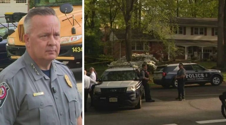 fairfax County Police Chief Kevin Davis stands before a school bus while officers