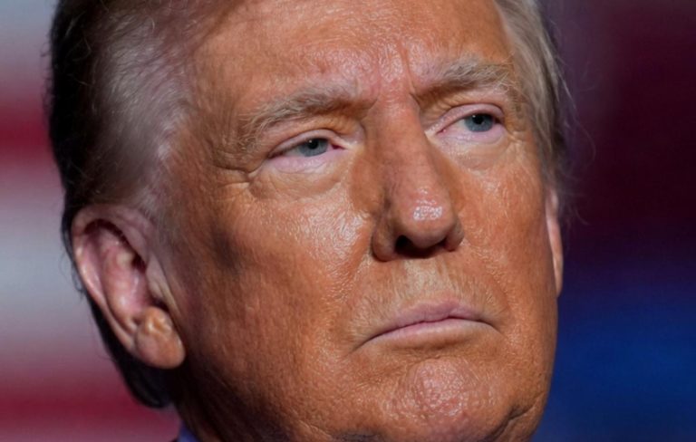 close-up of Donald Trump during a speech, serious expression