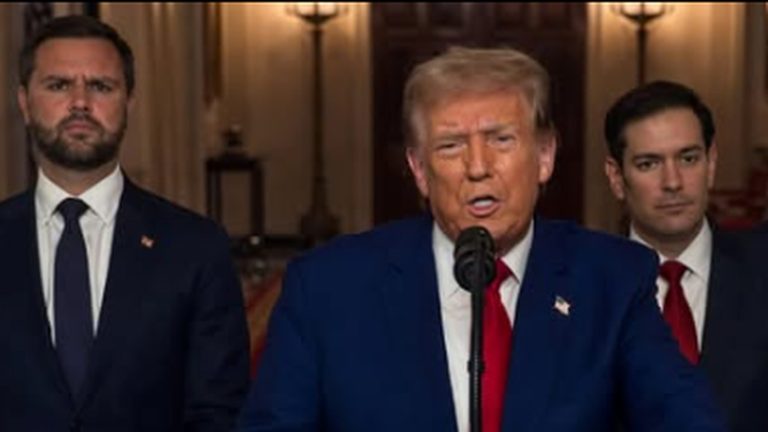 donald Trump speaks at a press conference with Marco Rubio and another man