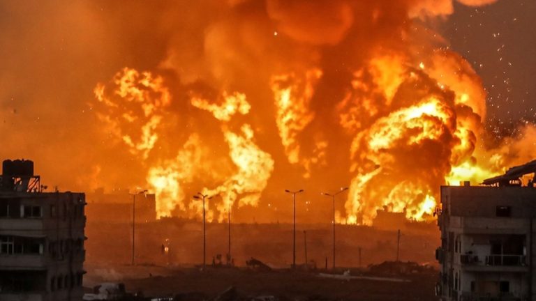 "Massive orange explosion with huge smoke plume"