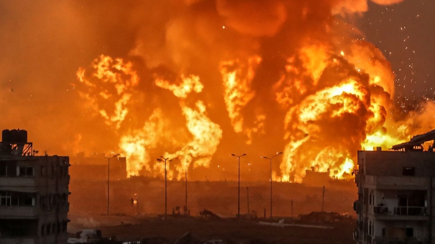 "Massive orange explosion with huge smoke plume"