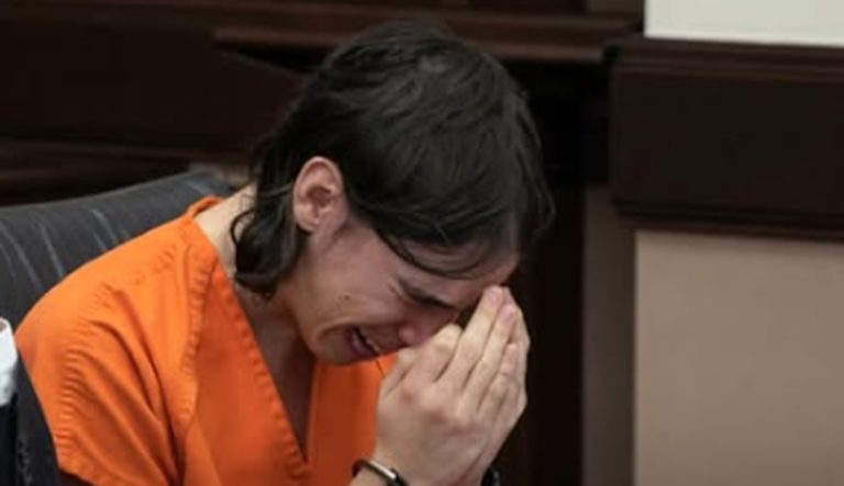 Teen crying in court orange jumpsuit