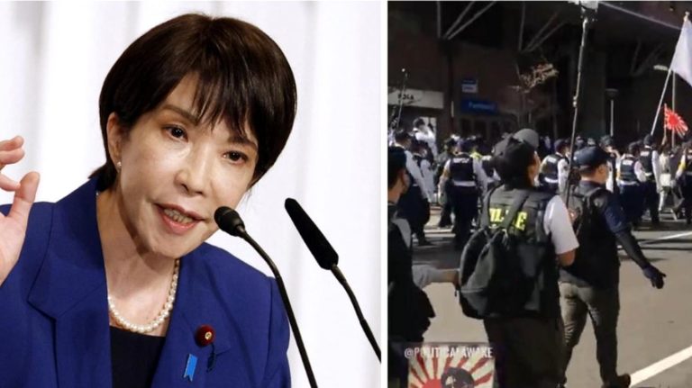 political rally with police presence, demonstrating public sentiment