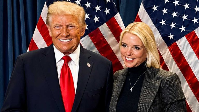 Donald Trump and Karoline Leavitt posing together.