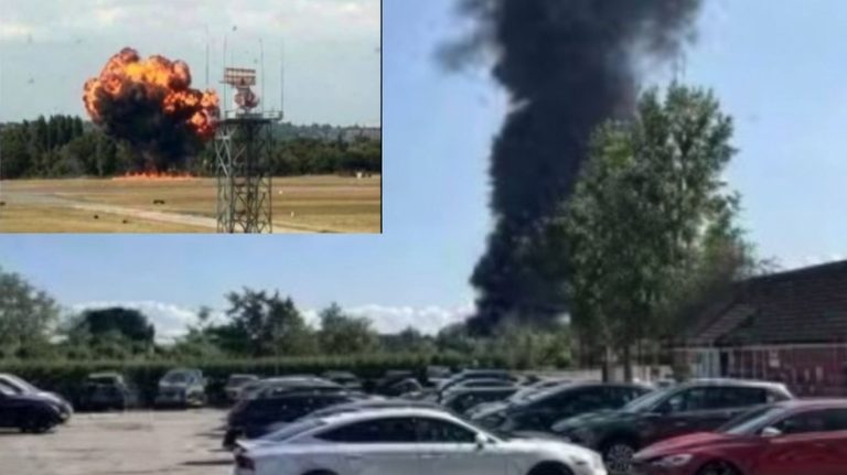 Massive explosion and black smoke plume over airfield