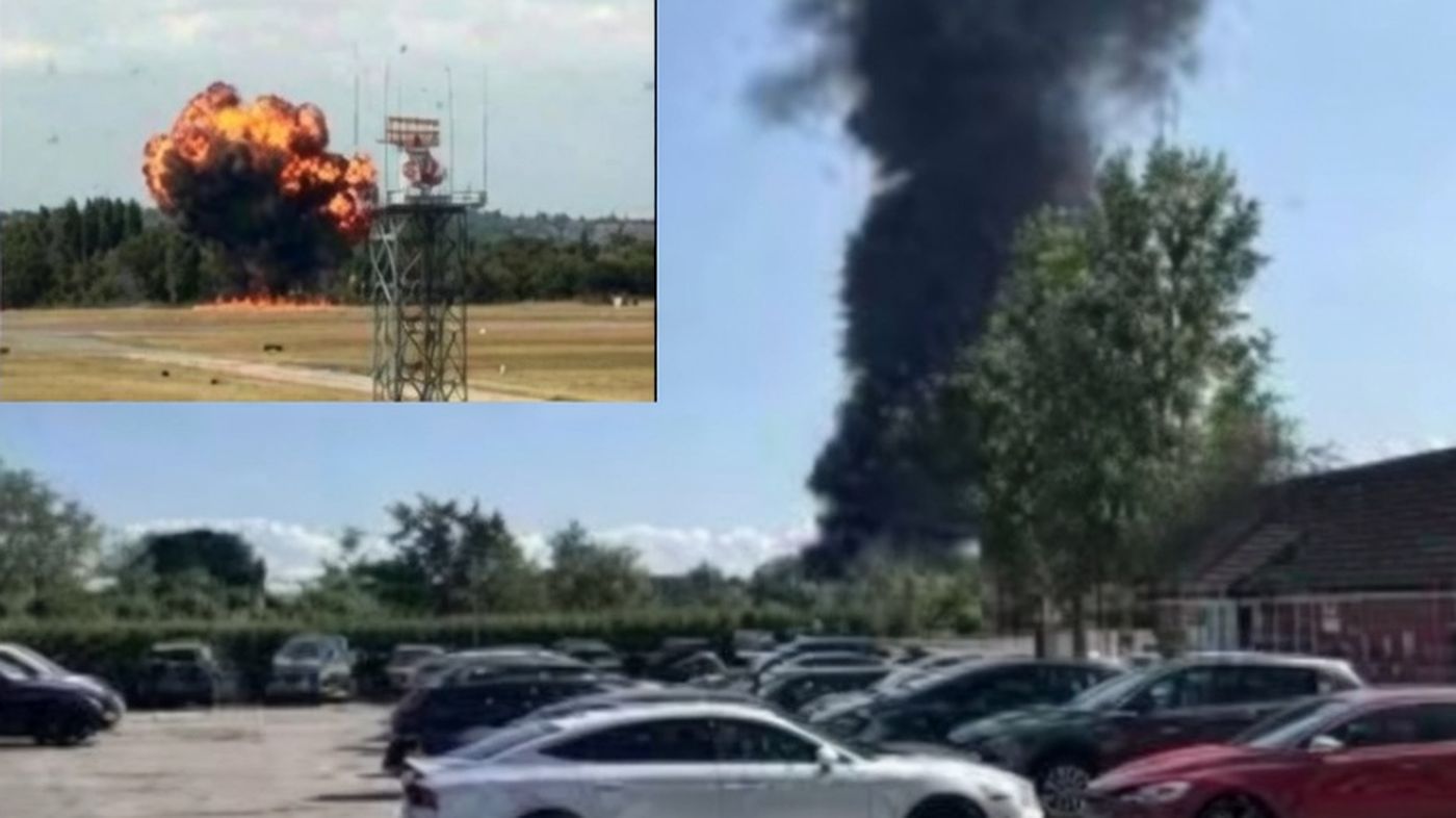 Massive explosion and black smoke plume over airfield