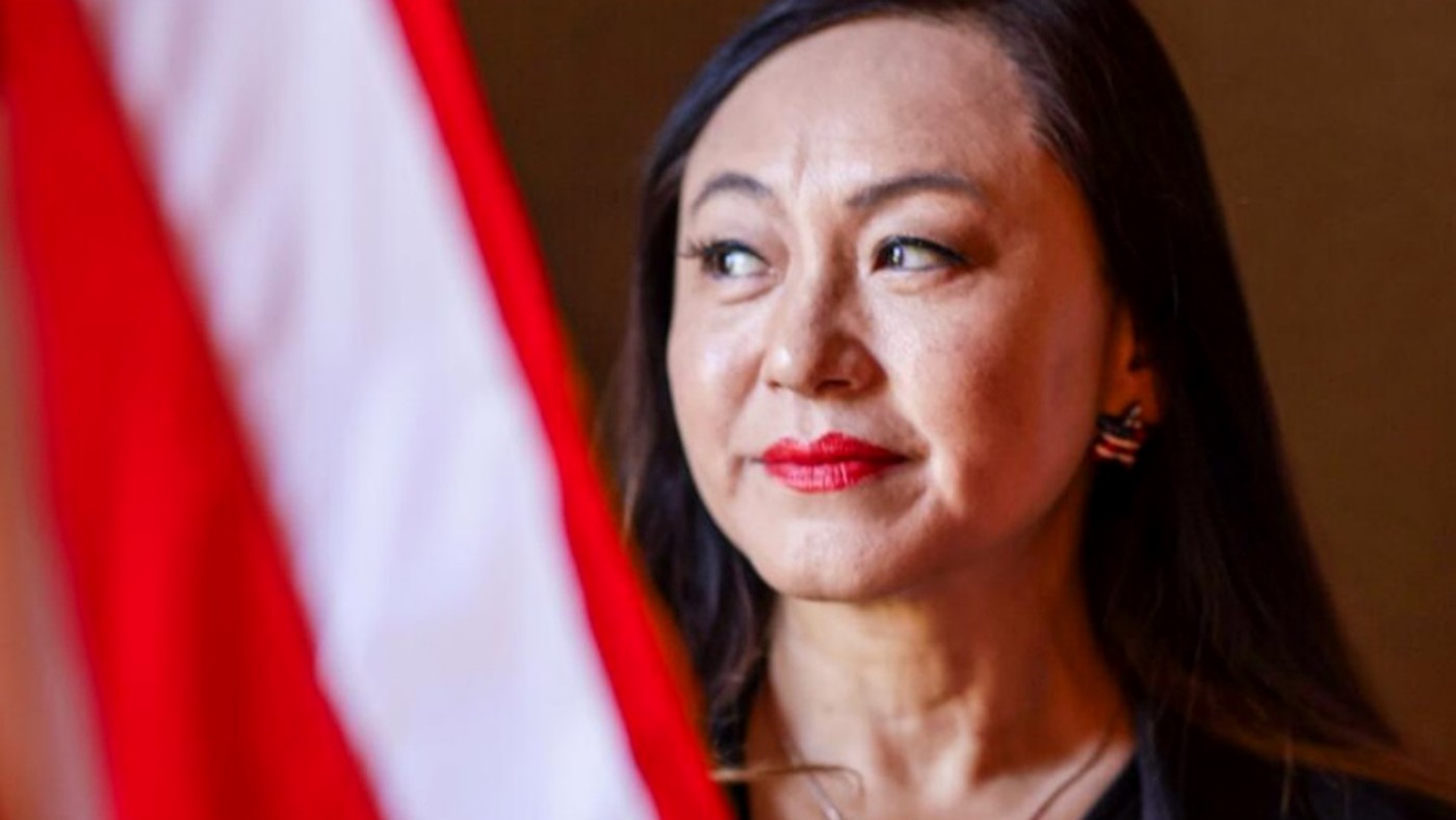 Asian American woman portrait with US flag