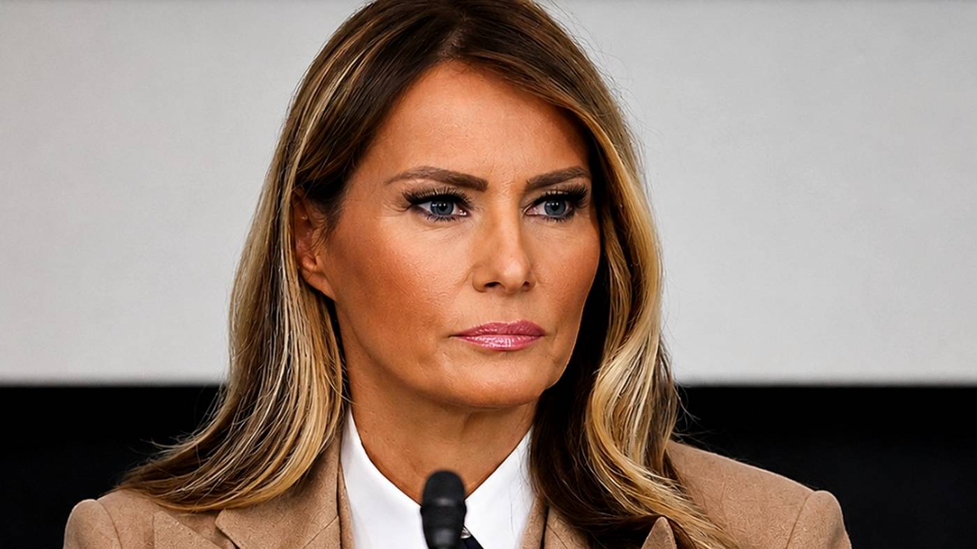Melania Trump listening at a panel discussion.