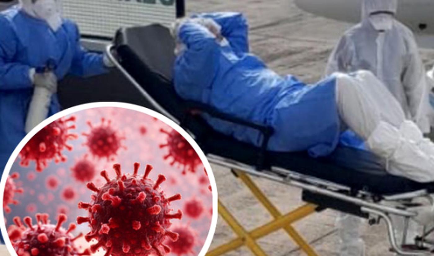 medical personnel transport patient amid COVID-19 outbreak