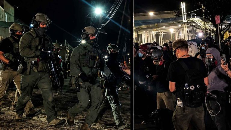 Tactical police officers and protesters at night.