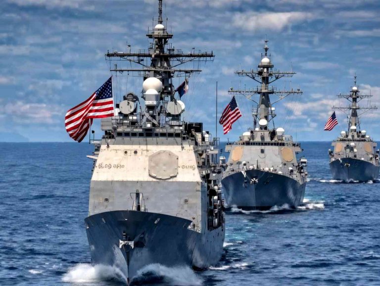 US Navy warships sailing in formation at sea