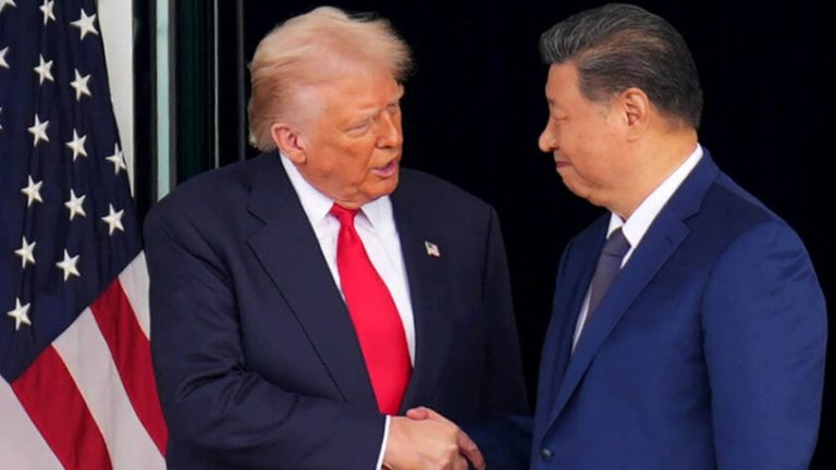 Trump stares down Xi Jinping during handshake