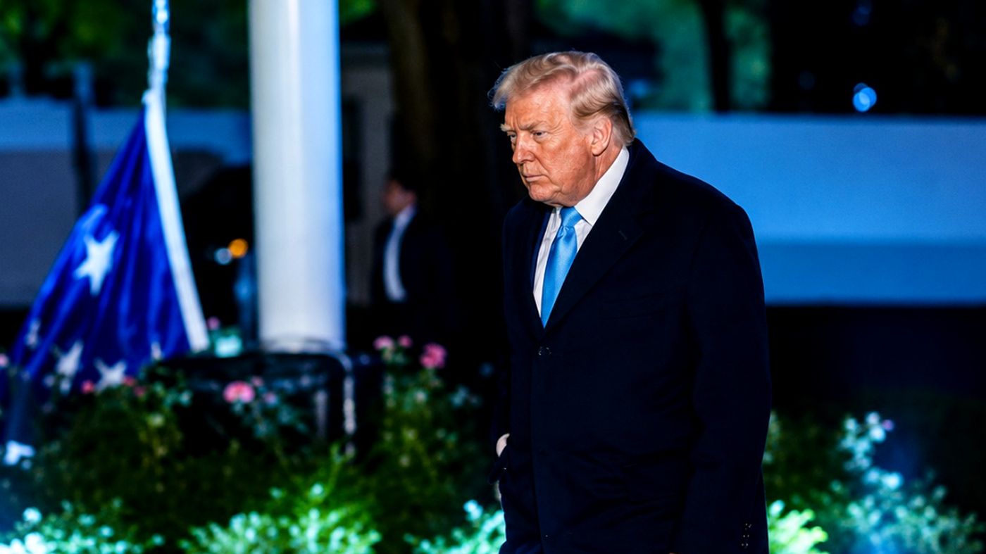 Trump walking at White House at night