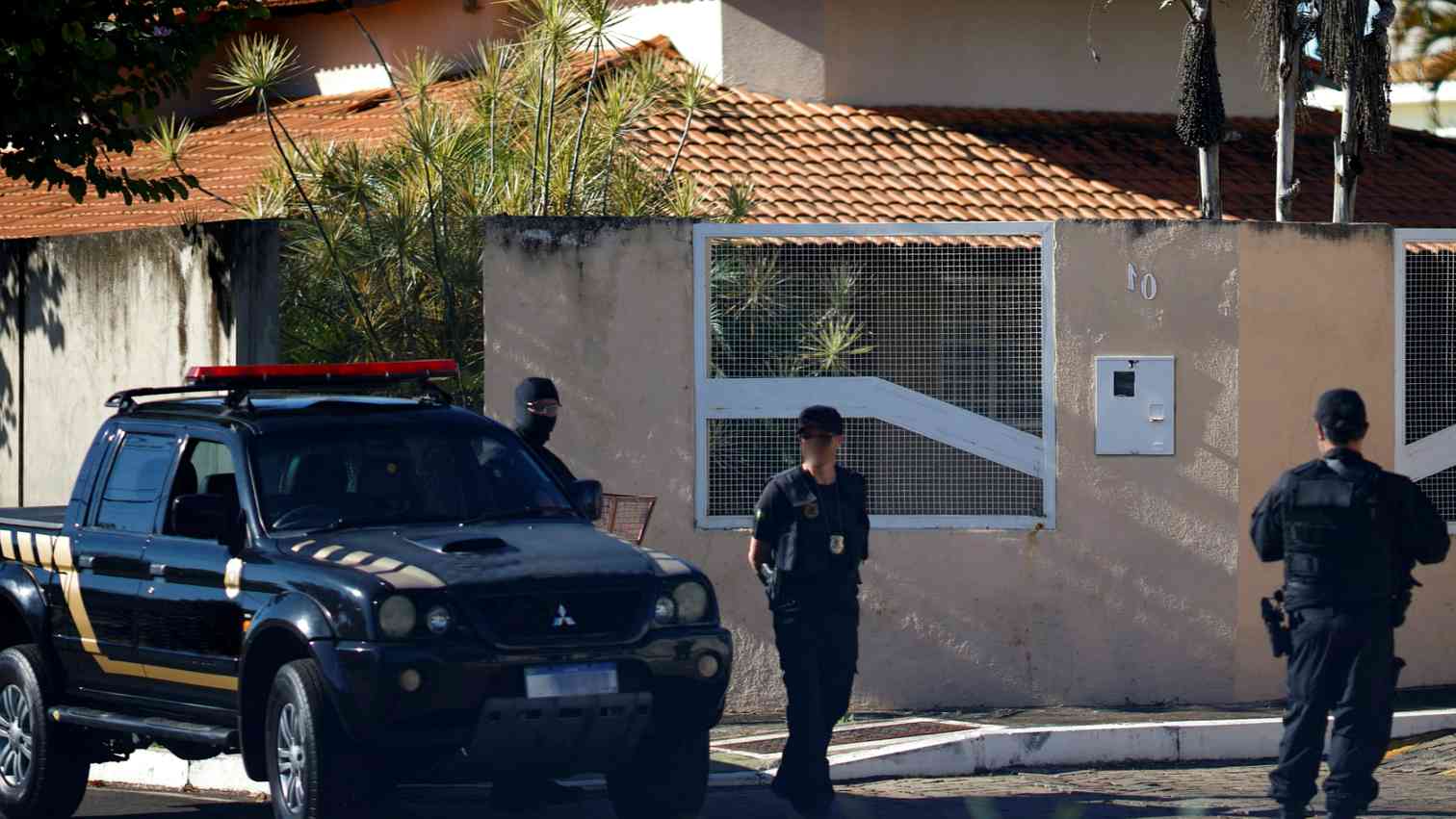 Police raid at house with R.I.P text overlay