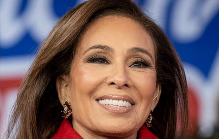 Jeanine Pirro smiling at a public event.