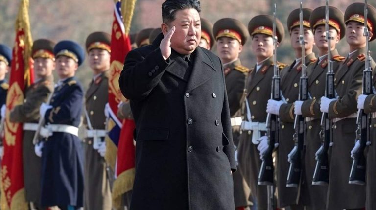 Kim Jong-un salutes North Korean soldiers in parade