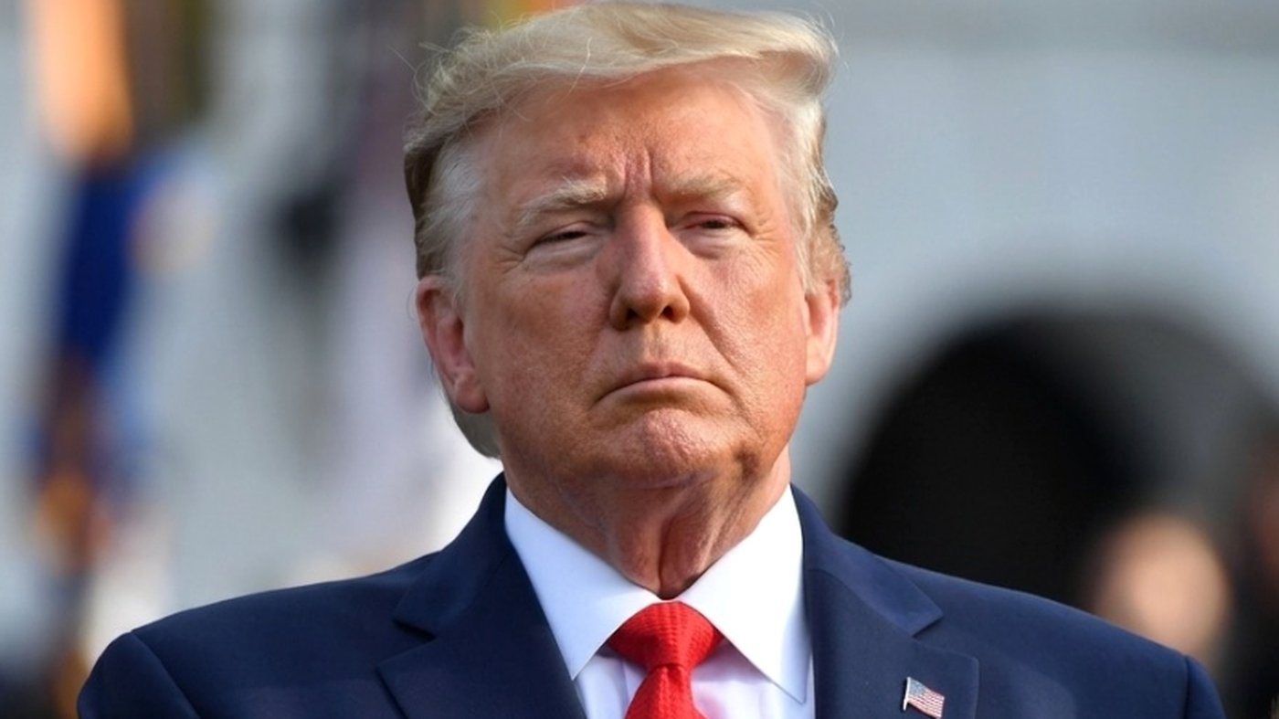 Donald Trump with hand on heart above betrayal text.