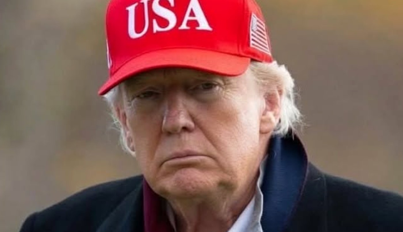 Donald Trump red USA hat rally appearance.