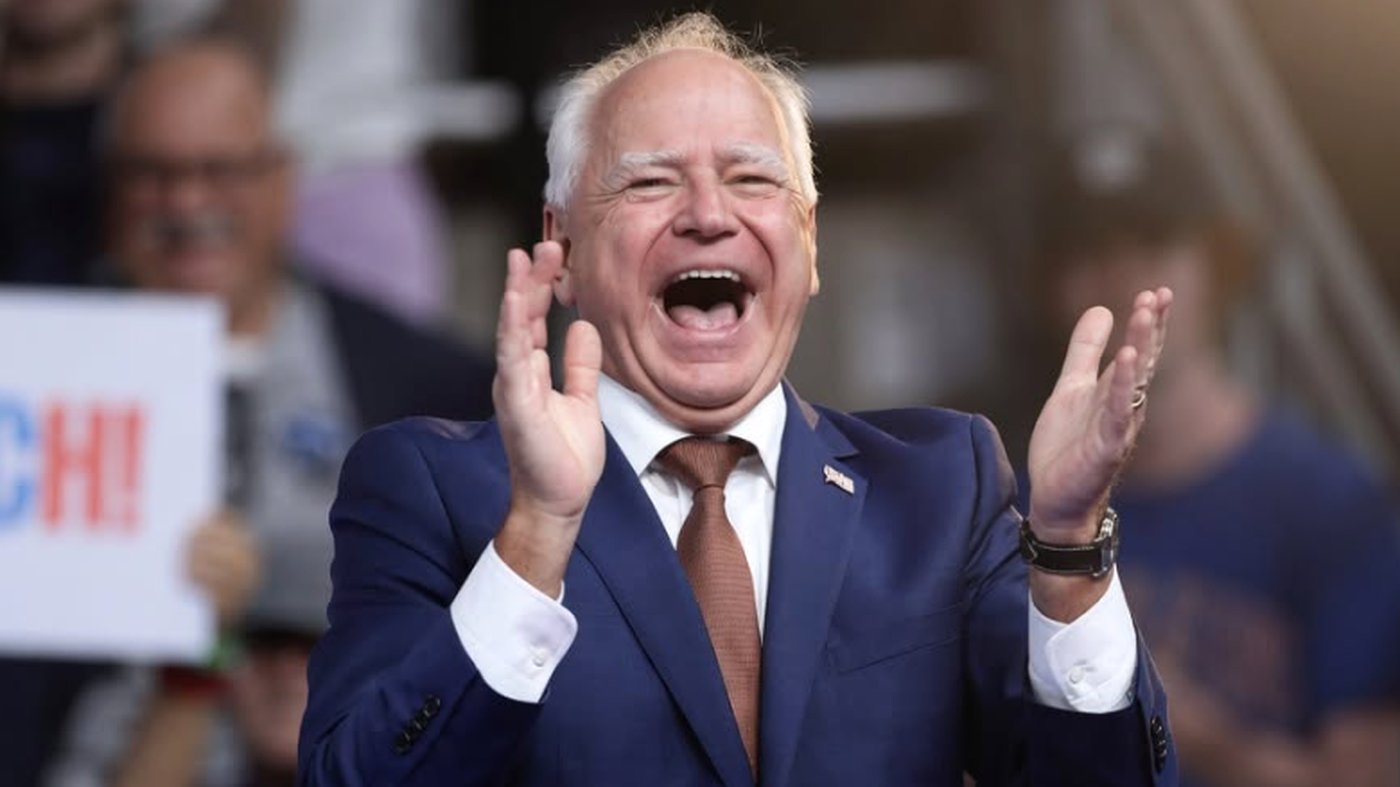 He's busted political figure laughing with hands raised