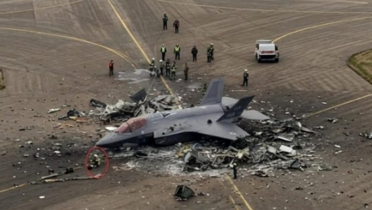F-35 fighter jet crash wreckage on a runway.