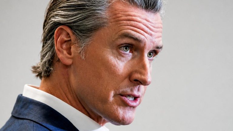 Gavin Newsom speaking in a close-up portrait.