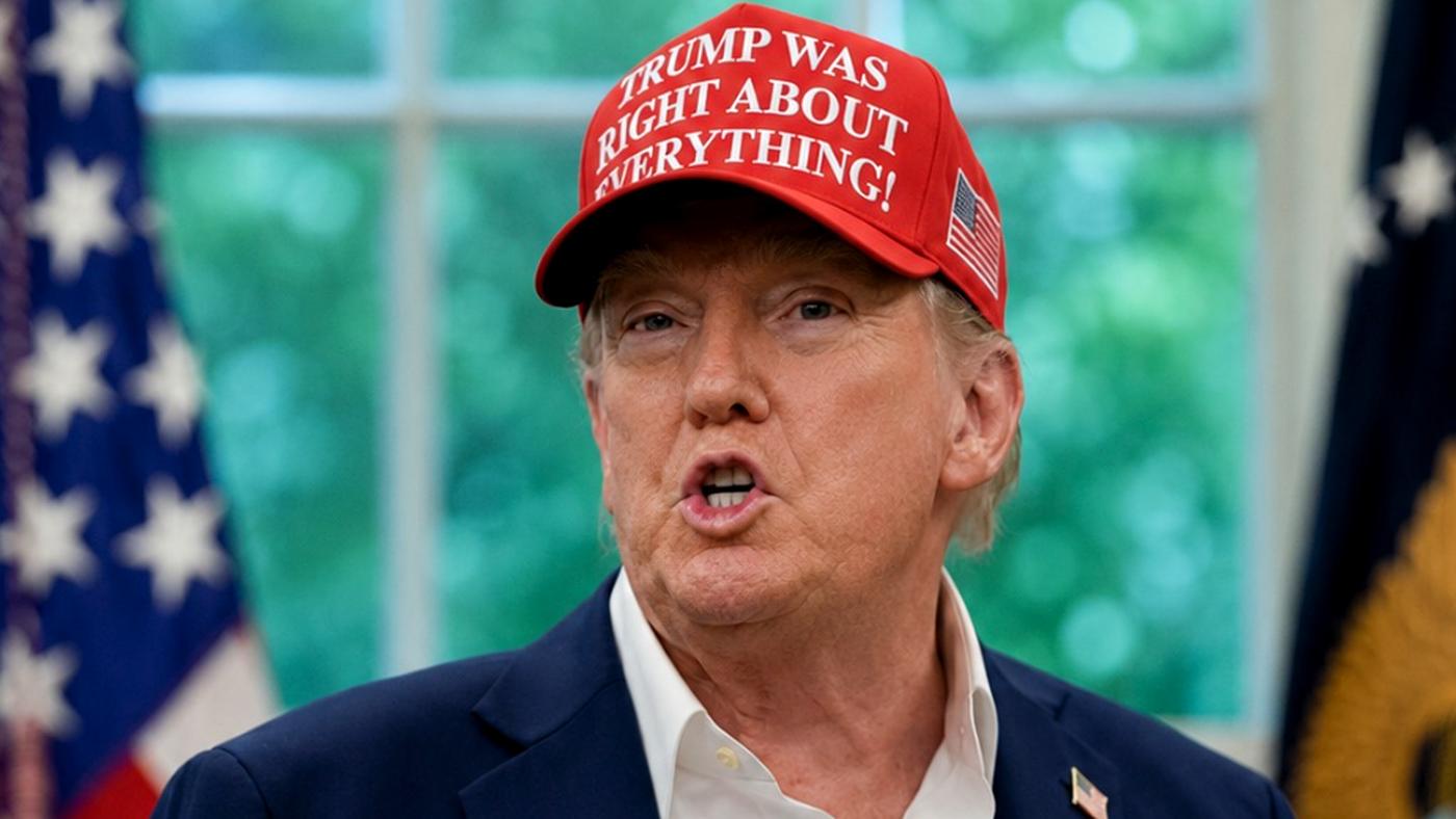 Donald Trump speaking below 2020 election text.